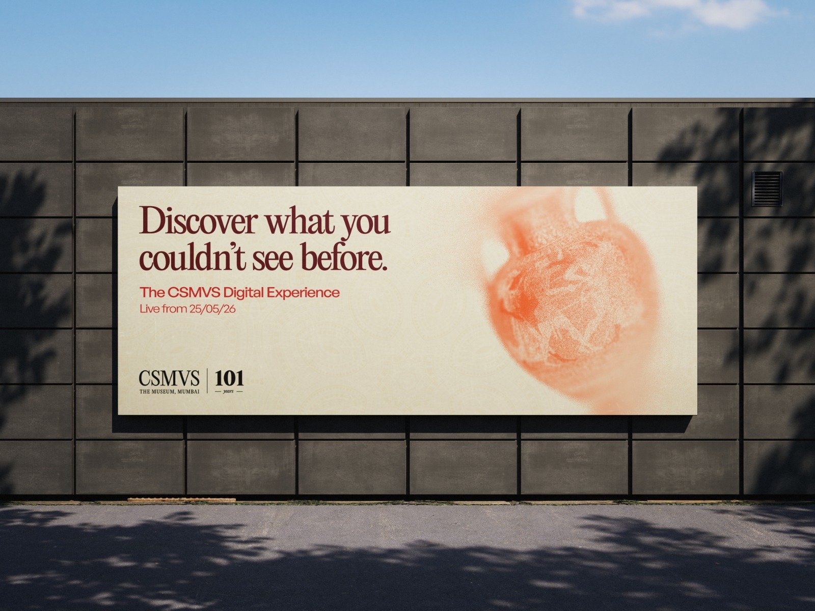 Billboard reading 'Discover what you couldn't see before. The CSMVS Digital Experience' with a scanned artifact